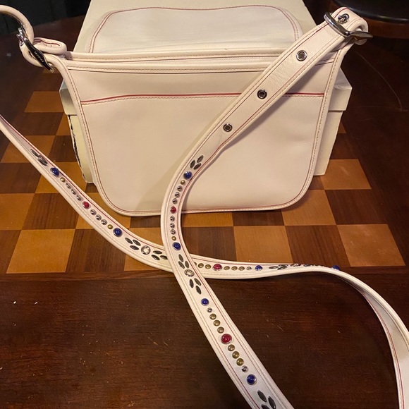 Small white coach crossbody with beaded strap